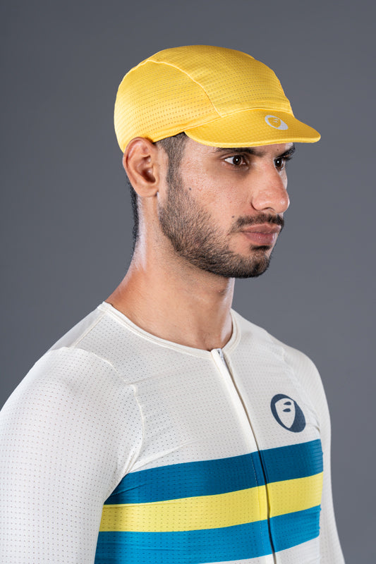 Man wearing yellow Hustle Unisex Cycling Cap