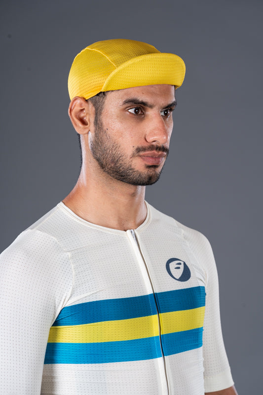 Man wearing yellow Hustle Unisex Cycling Cap