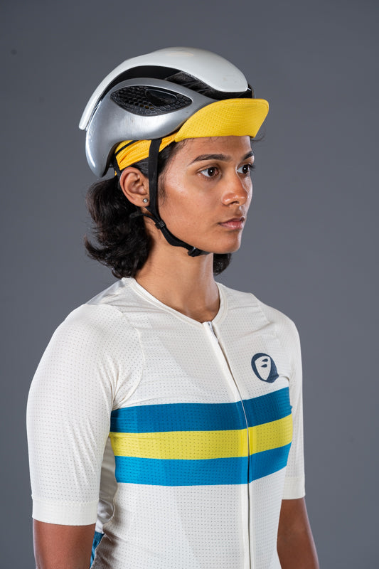 Women wearing cycling helmet on Yellow Hustle Unisex Cycling Cap